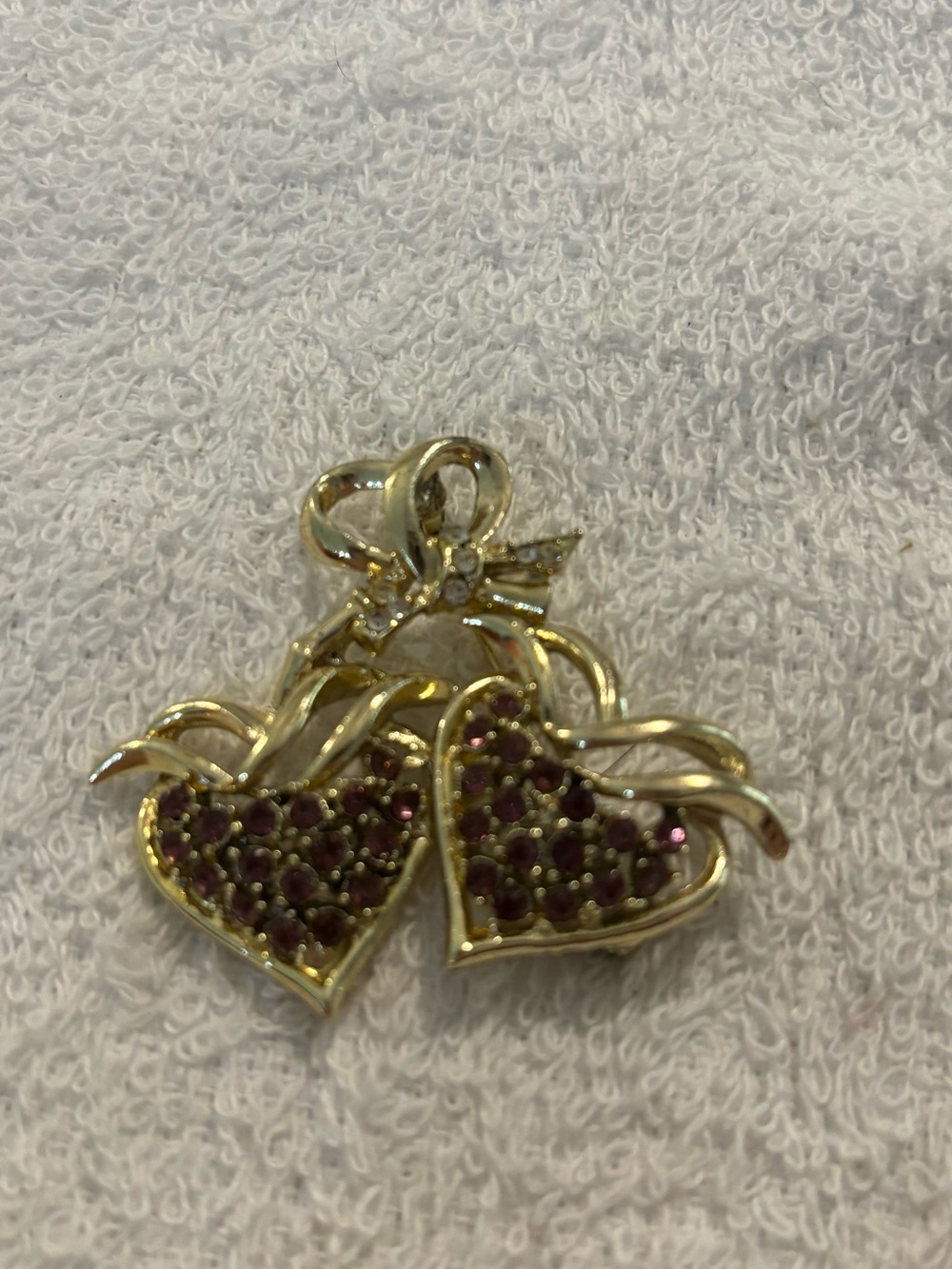 Gold Tone Double Heart Brooch with Purple Rhinestones and Bow